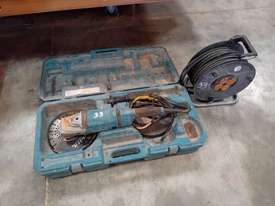 a blue tool case with tools in it sitting on the floor