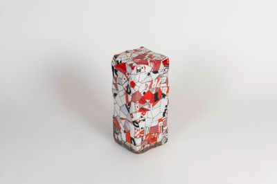an image of a red and white vase sitting on top of a white surface