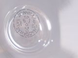 a close up view of a glass with a label on it