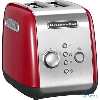 an image of a red toaster on a white background