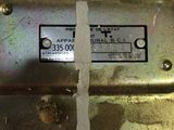 a close up of a metal box with a label on it