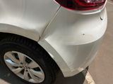 a close up of a car that has a denting on it
