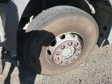 a flat tire on the side of a truck
