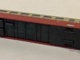 a toy train that is sitting on a white surface