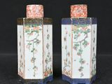 pair of chinese porcelain vases with flowers and birds on them