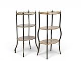 pair of three tiered side tables with glass shelves on each side