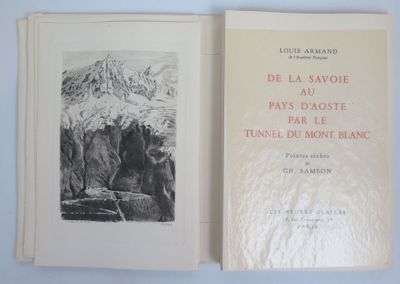 an open book with a picture of a mountain in the background