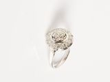 an image of a diamond and white gold ring on a white background