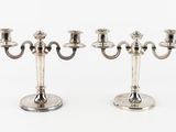 pair of silver plated candelabs with candlesticks on stands