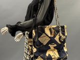 black and gold chandelier bag on mannequin mannequin mannequin mannequin mannequin mannequin mannequin mannequin