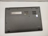 a close up of a laptop on a white surface
