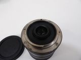 a camera lens sitting on top of a white table