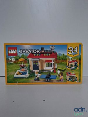 une boîte de Lego Creators contenant une maison
