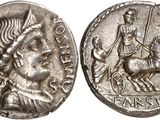 a silver coin with an image of a man on a horse