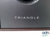 a close up of a speaker on a table