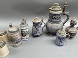 many different types of beer mugs on the table