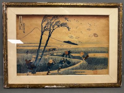 une image représentant un tableau où l'on voit des personnes dans un champ en train de faire voler des cerfs-volants