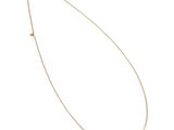 a gold chain necklace with a single diamond on a white background