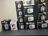 many boxes of coffee on a table in a room