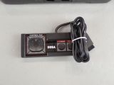 an image of a remote control with a cable