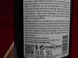 a bottle of wine that is sitting on a table