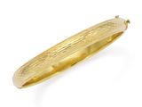 a close up of a gold plated bang with a curved design