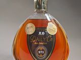 a bottle of brandy that is sitting on a table