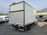 a white box truck parked in a parking lot