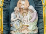 a statue of a manger with a baby in a manger