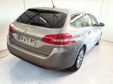 a silver car that is parked in a garage