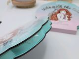 a purse that is sitting on a table next to other items