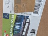 a cardboard box with a picture of a car on it