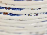 a lot of plates stacked on top of each other