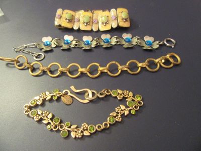 a lot of bracelets that are sitting on a table