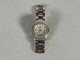 an image of a woman ' s wrist watch with a diamond bezel