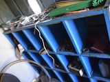 a blue bookcase filled with lots of different items