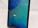 a tablet with a screen on it sitting on a table