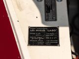 a plaque on the side of a red vehicle