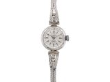 an image of a woman ' s wrist watch on a white background