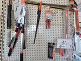 a picture of a pegboard with tools hanging on it
