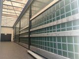 an image of a large warehouse with a lot of windows