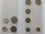 a lot of coins in a plastic bag on the table