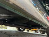 a close up view of a car ' s exhaust pipe