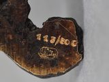 a close up of a piece of wood with a hole in it