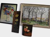 three paintings on the wall next to a vase of flowers