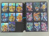 a lot of cards in a binder on the table