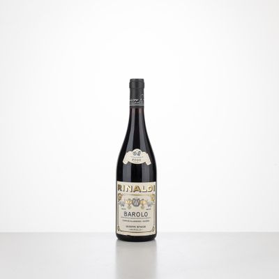 the bottle of wine is sitting on the table with a white background