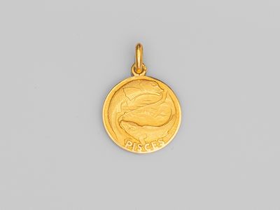 une pièce d'or sur laquelle est représenté le visage d'une femme