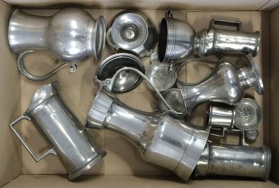 a box full of silver items that are in a box