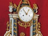 a clock that is sitting on top of a table